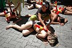 06.07.08. Ensangrentados y con banderillas clavadas en la espalda, 60 activistas protestamos en las mismas puertas de la Plaza de Toros de Pamplona.