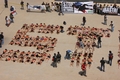 Semidesnudos, banderilleados y ensangrentados los activistas formaron la palabra STOP para denunciar las atrocidades de la tauromaquia al mundo entero.
